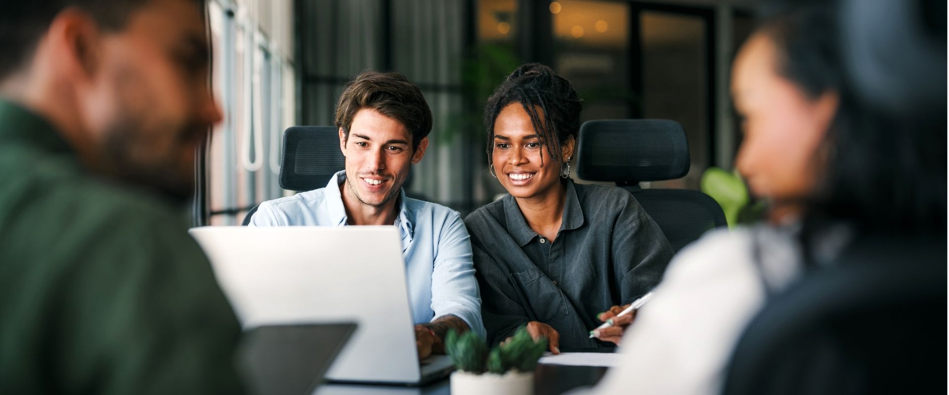 Professionals using AI in a meeting