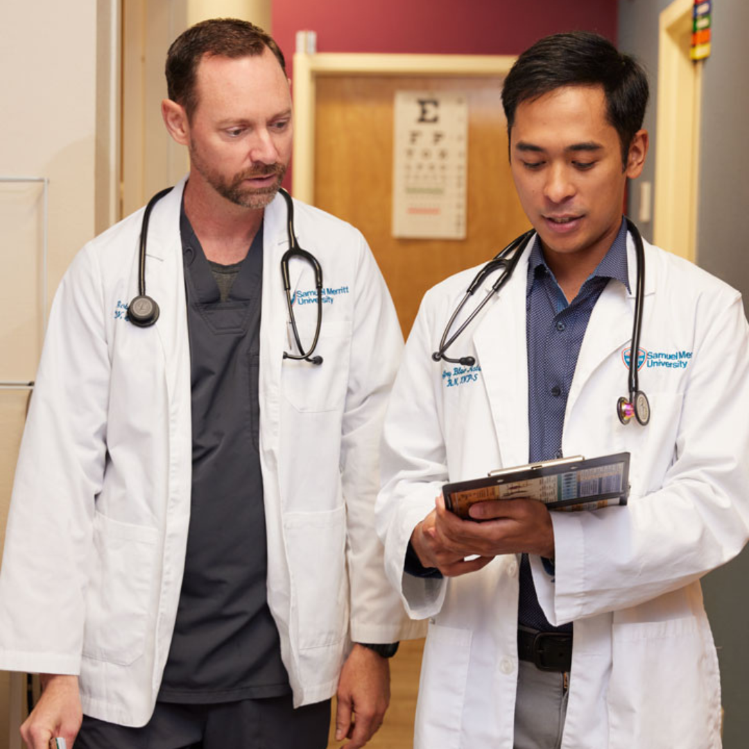 SMU doctors look at a patient file