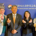King Sejong Institute and SFSU representatives give finger hearts