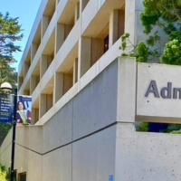 Administration building and path out of campus