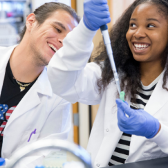 Clinical lab scientists working together in the lab