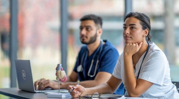 Pre-medical students listening in class